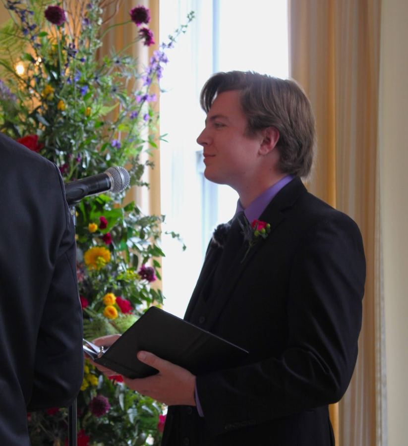 Reed officiating a wedding ceremony