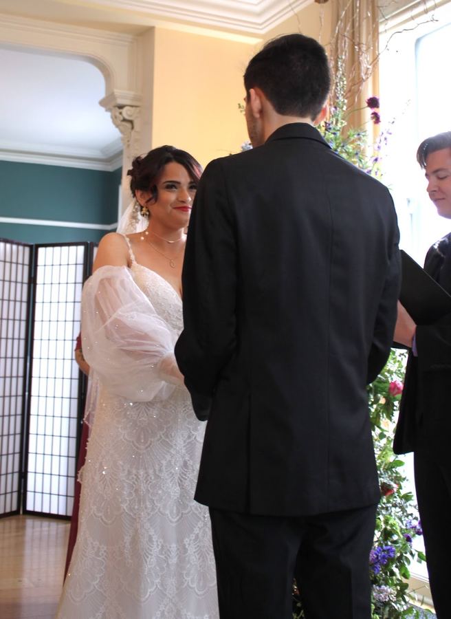 Reed officiating a wedding ceremony